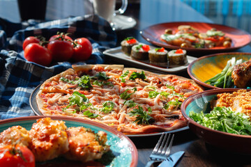 Yummy homemade pizza on a buffet table in a beautiful setting, sunny lighting