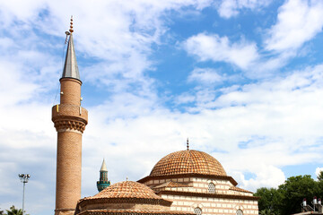 Historical touristic mosque with blue sky and clouds in the background. Selective focus.