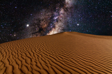 Fototapeta Amazing views of the Sahara desert under the night starry sky obraz