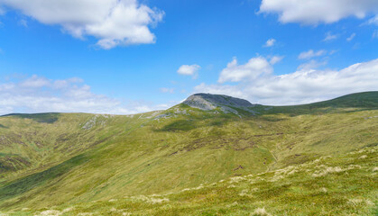 The  mountain summit of Carn Mairg, Coire Chearcaill and Gleann Pollaidh from below Meall na Aighean in the Scottish Highands, UK landscapes