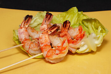 Shrimp shashlik on a binrage background