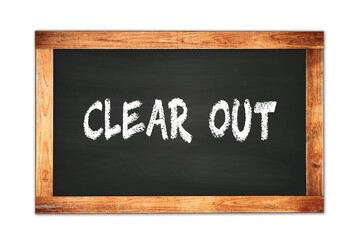 Fototapeta premium CLEAR OUT text written on wooden frame school blackboard.
