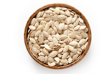 Fresh pumpkin seeds background. Close-up.