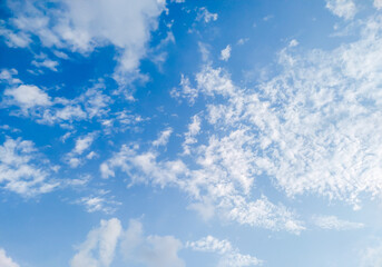 Clear blue sky with a few white clouds
