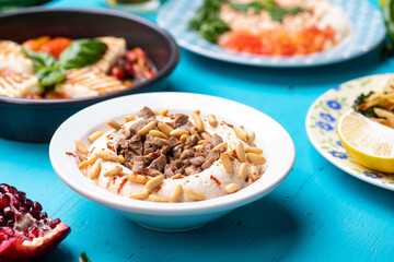 Traditional Lebanese Food of Hummus With Meat Topping..