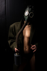 Dark sexy naked military woman in gas mask nude art 