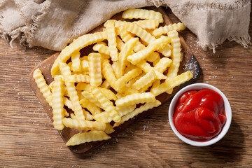 French fries with ketchup,  top view