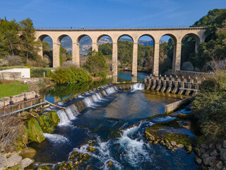 Aerial view Aqueduct of the canal de Carpentras at the Fontaine de Vaucluse - obrazy, fototapety, plakaty