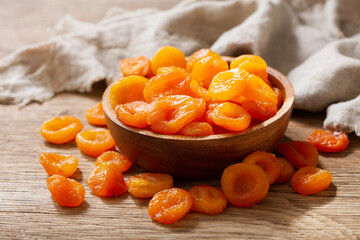 Dried apricots on a wooden table