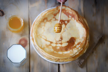 A stack of pancakes on a plate. Maslenitsa.