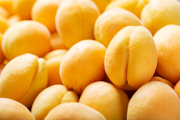 Fototapeta na wymiar fresh ripe apricots as background