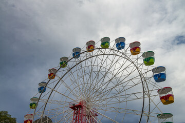 Colorful ferris wheel against the sky