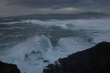 waves crashing on the rocks