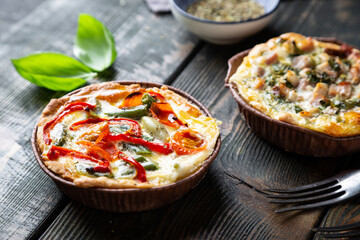 Various mini quiches on the table