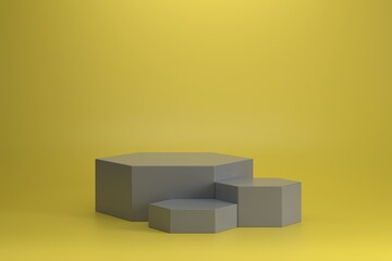 Three different size of ultimate gray hexagonal podium on illuminating yellow background.