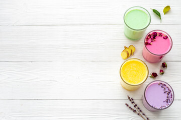 Colorful super latte coffee or tea with turmeric, beetroot and matcha