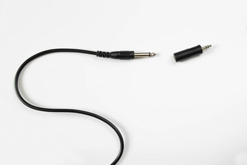 Jack plug and mini jack connector on white background