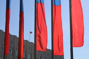 red flags on the street of the city