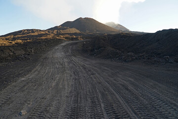 Mount Etna road for 4wd trucks and cars, Etna summit and crater with dangerous volcanic activity trek hiking guided tour concept, Sicily, Italy