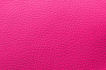 Texture of pink Italian leather with a pattern.