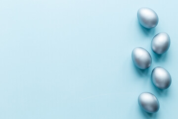 Silver Easter eggs. Easter decoration, top view