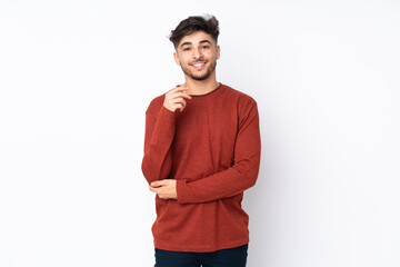 Arabian handsome man over isolated background laughing