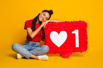 Portrait of pretty glad cheerful girl leaning on big board like influenzer business isolated bright...