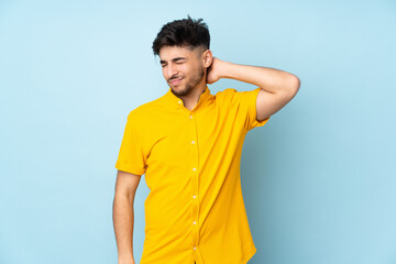 Arabian handsome man over isolated background with neckache