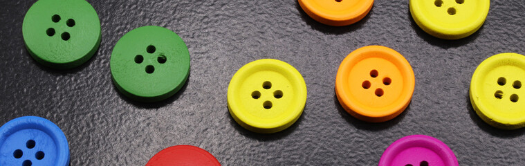 close-up colorful buttons for sewing on  background