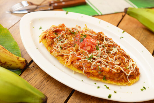 patacon, typical Colombian food, patacon with chicken and cheese