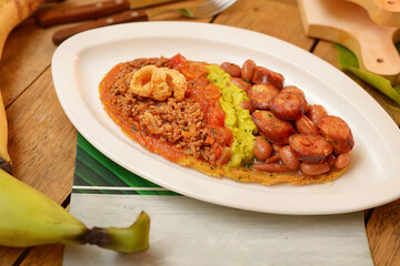patacon, typical Colombian food, patacon with chicken and cheese