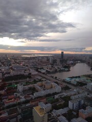 view of the city buildings and the sky from a height. High quality photo