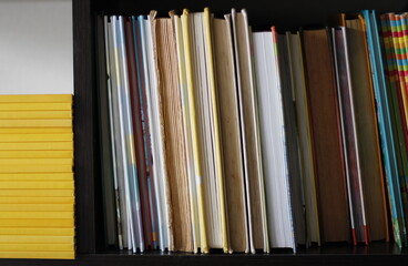 Stacks of books on the shelf