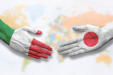 Italy and Japan - Italian and Japanese - Flag handshake symbolizing partnership and cooperation