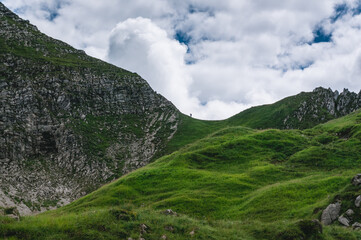 Alpine landscape with mountain-climber