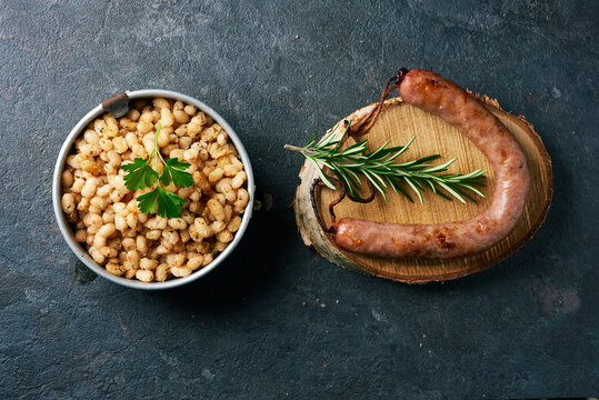 fried sausage and white beans typical of catalonia