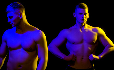 Strong men twins with abdominal strength, fit males with muscular six pack abs.