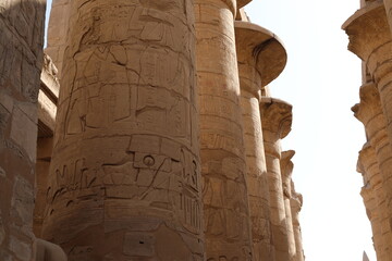 Karnak temple in historic city. Ruins of the ancient town. View of the antique famous sculptures at...