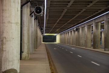 Naklejka premium Tunnel illuminated at end.