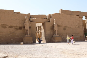 Karnak temple in historic city. Ruins of the ancient town. View of the antique famous sculptures at the Karnak Temple in Luxor, Egypt. Travel to African continent. UNESCO World Heritage Site.