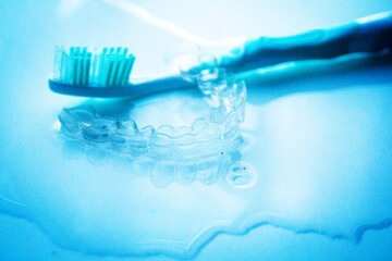 Invisible bracket aligners