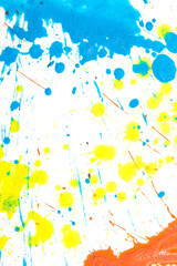 Fototapeta na wymiar Orange, Blue and Yellow Acrylic Paint Splatters and Lines on White Bckground