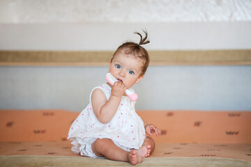 Portrait of a cute little girl wearing dress.