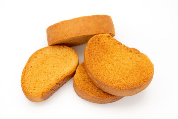 a piece of brown bread biscuit isolated on a white background