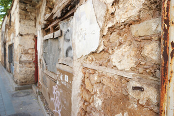 Texture of old ruined building wall. An ancient stone building background.