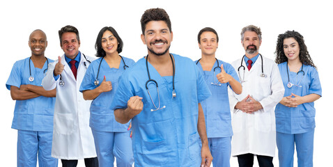 Happy latin american male doctor with motivated medical team