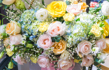 Beautiful, colorful, vibrant bouquet of flowers; roses, irises, daisies, hydrangea,.. Wedding, event, women's day concept
