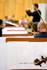 Row of music stands during the orchestra rehearsal. Equipment of the concert hall.