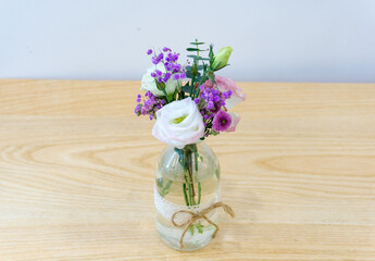 A beautiful bouquet of flowers in a vase on the table. National women's day, Mother's day concept