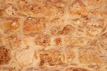 Natural stone wall texture. Pattern of stone building. Abstract background.